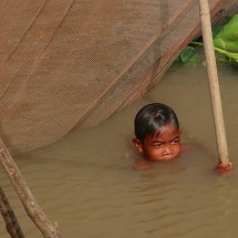 Boy enjoying the not so hot water