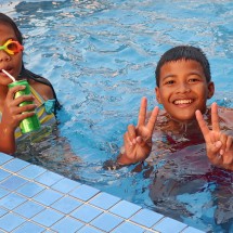 Kids in the pool on top of our hotel in Phnom Penh - King Grand Boutique