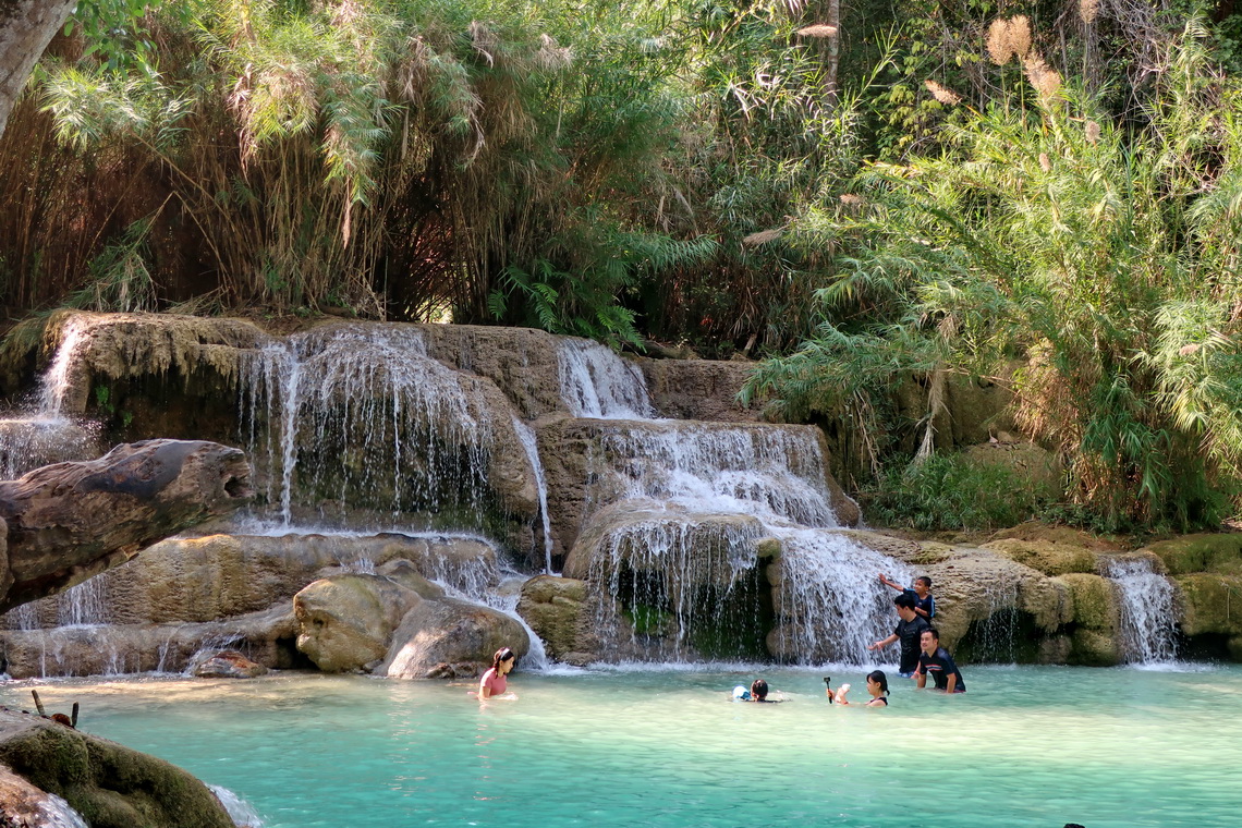 Swimming below Kuang Si Waterfalls